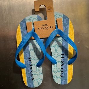 New Women’s Coach Flip Flops. Size: 7